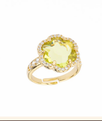 Anello con top a forma di fiore a sei petali in brass dorato con cristallo sfaccettato lilla