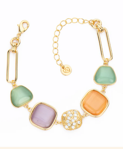 Bracciale con catena in brass dorato con carrè ondulati in pavè di zirconi clear, cat eye violetto