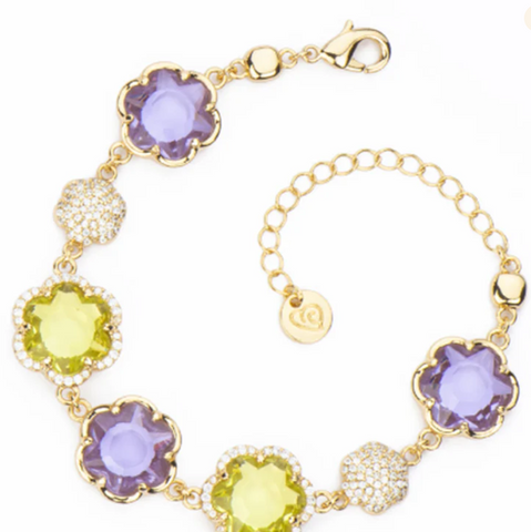 Bracciale con cristalli sfaccettati dal taglio a fiore citrino e lilla alternati con elementi in pavè di zirconi clear su base dorata.