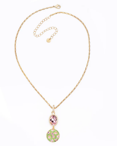 Collana con catena in brass dorato con pendenti in cristallo rose e tondo in pavè mix di zirconi peridot e light rose.